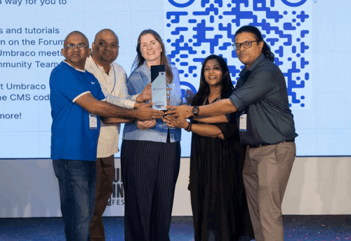 Sponsor appreciation slide/moment on stage, Giriraj Digital branding visible