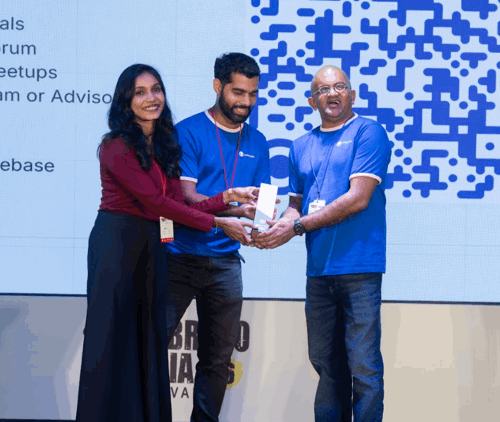 Sponsor appreciation slide/moment on stage, Giriraj Digital branding visible