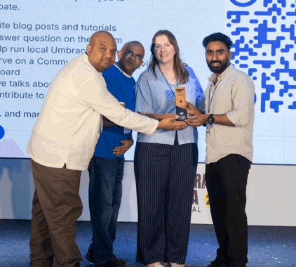 Sponsor appreciation slide/moment on stage, Giriraj Digital branding visible